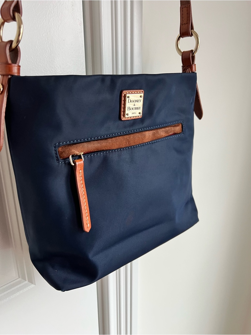 Dooney & Bourke Navy Handbag with Red Interior and Brown Trim